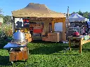 Vouwtent 3x4,5 Solid 30 zand op een tuinbeurs